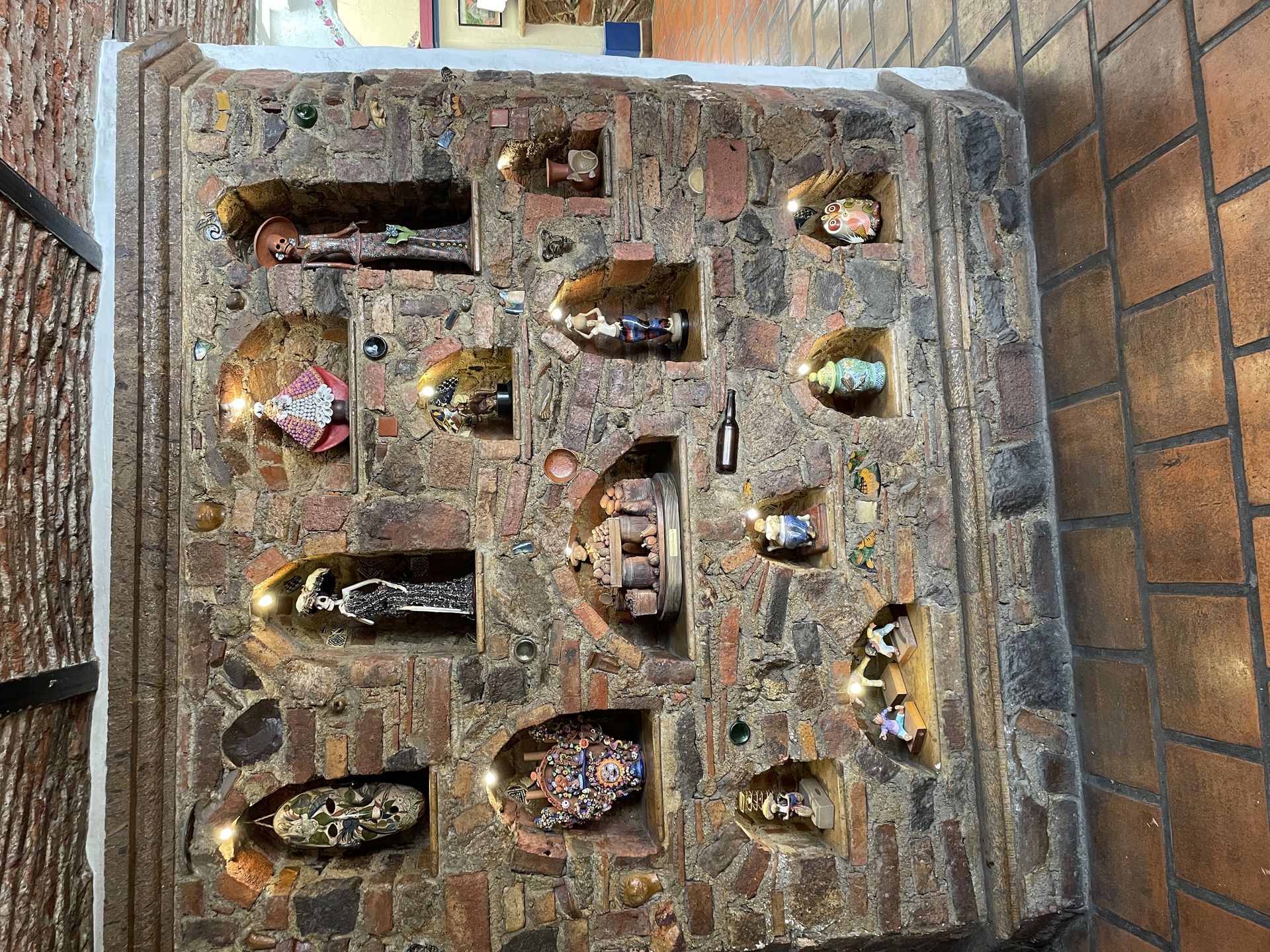 Ceramic folk art in wall niches