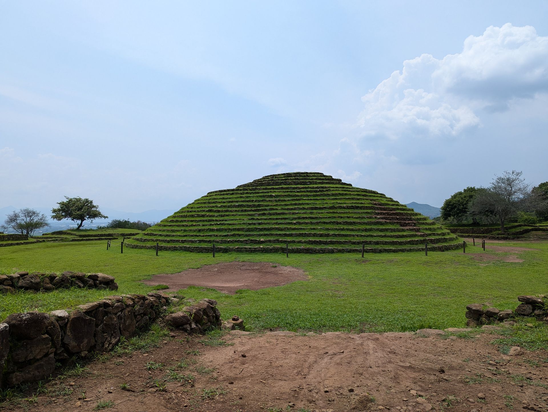 Lawn path to a circular pyramid