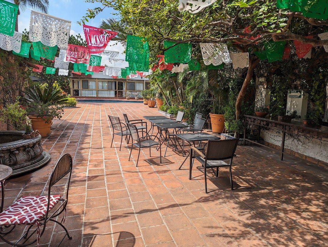 Courtyard seating under papel picado in Tlaquepaque