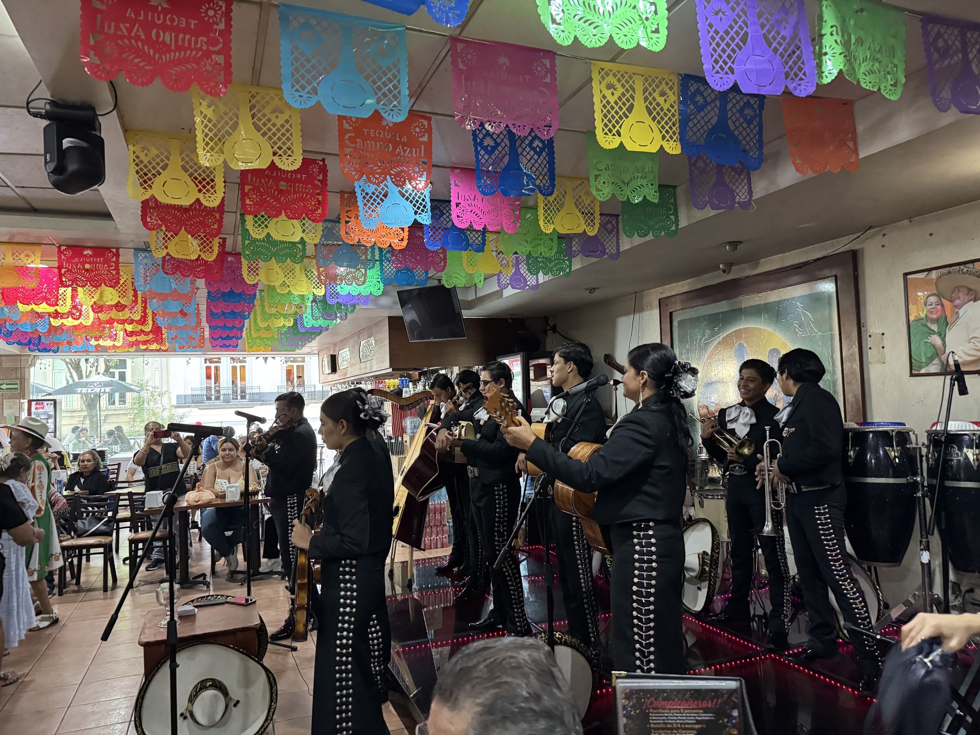Mariachi band performing in a Guadalajara restaurant